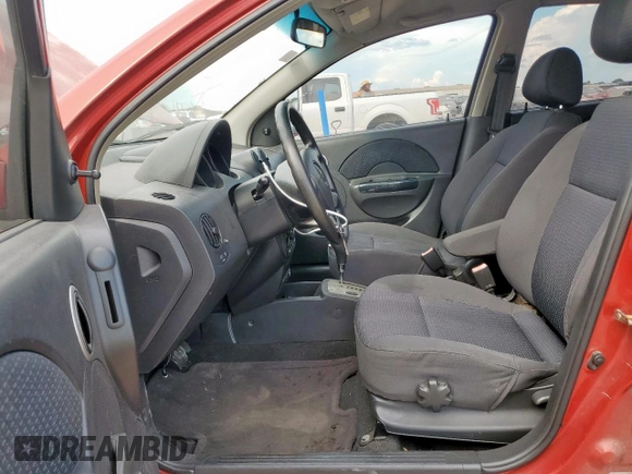2007 Chevrolet Aveo LS with VIN KL1TD66697B703022, listed as a Copart auction lot 62301515 with 124,668 mi miles and Salvage title. Bid and sale history available at DreamBid. Image 7.