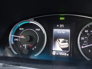 2015 Toyota Camry Hybrid LE with VIN 4T1BD1FK5FU166653, listed as a IAAI auction lot 41412963 with 105,428 mi miles. Bid and sale history available at carsss.com. Image 7.