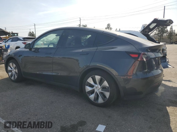 2024 Tesla Model Y Long Range z VIN 7SAYGAEE0RF021084, wystawiony jako Copart lot #51973285 z przebiegiem 25 990 mil mil oraz Szkoda całkowita • Salvage title. Historia ofert i sprzedaży dostępna na DreamBid. Obrazek 2.