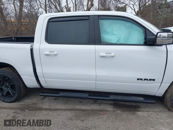 2021 Ram 1500 Big Horn with VIN 1C6SRFFT1MN721561, listed as a IAAI auction lot 42017023 with 62,023 mi miles and . Bid and sale history available at DreamBid. Image 13.
