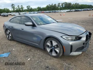 2023 BMW i4 eDrive35 z VIN WBY43AW02PFP44405, wystawiony jako Copart lot #56287965 z przebiegiem 18 085 mil mil oraz Czysty tytuł • Clean title. Historia ofert i sprzedaży dostępna na DreamBid. Obrazek 4.