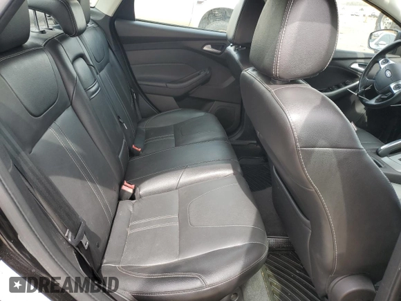 2013 Ford Focus SE z VIN 1FADP3F28DL292238, wystawiony jako Copart lot #51016715 z przebiegiem 165 699 mil mil oraz Szkoda całkowita • Salvage title. Historia ofert i sprzedaży dostępna na DreamBid. Obrazek 10.