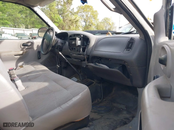 1999 Ford F-150 Work Series with VIN 1FTZF1728XKA04105, listed as a IAAI auction lot 41856047 with 176,890 mi miles. Bid and sale history available at carsss.com. Image 5.