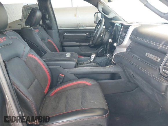 2022 Ram 1500 TRX with VIN 1C6SRFU97NN353587, listed as a IAAI auction lot 42174702 with 35,305 mi miles and . Bid and sale history available at DreamBid. Image 5.