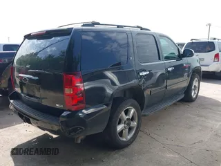 2012 Chevrolet Tahoe LT with VIN 1GNSCBE01CR164093, listed as a IAAI auction lot 42680741 with 183,638 mi miles and . Bid and sale history available at DreamBid. Image 4.