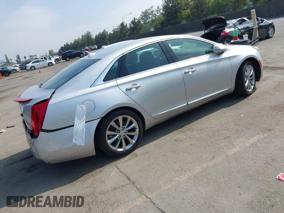 2014 Cadillac XTS Luxury with VIN 2G61N5S30E9294994, listed as a IAAI auction lot 42617654 with 159,573 mi miles and . Bid and sale history available at DreamBid. Image 4.