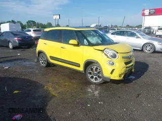 2014 FIAT 500L Trekking z VIN ZFBCFADH4EZ013485, wystawiony jako IAAI lot #42104043 z przebiegiem 157 744 mil mil oraz . Historia ofert i sprzedaży dostępna na DreamBid. Obrazek 1.