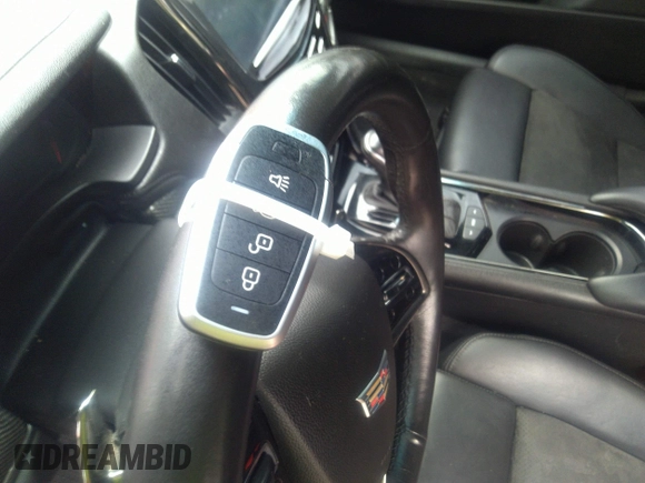 2016 Cadillac ATS-V z VIN 1G6AN1RY6G0161714, wystawiony jako IAAI lot #42394727 z przebiegiem 84 041 mil mil oraz . Historia ofert i sprzedaży dostępna na DreamBid. Obrazek 11.