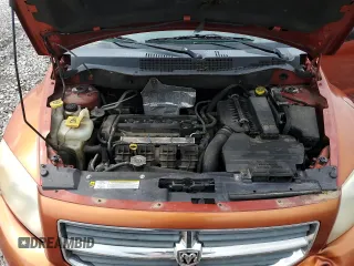 2010 Dodge Caliber Mainstreet z VIN 1B3CB3HA1AD568937, wystawiony jako Copart lot #55159255 z przebiegiem 128 014 mil mil oraz Szkody całkowita. Historia ofert i sprzedaży dostępna na DreamBid. Obrazek 11.