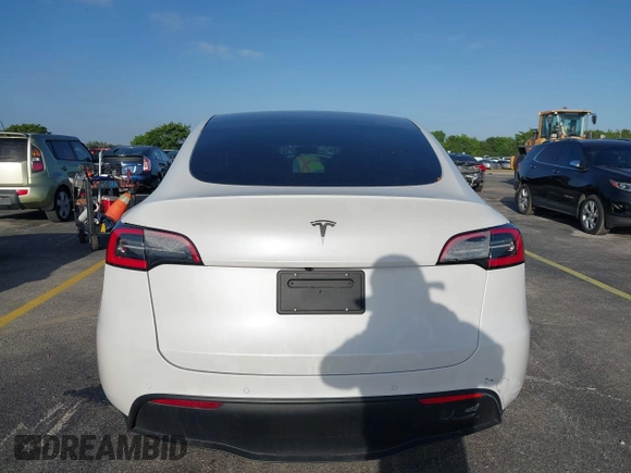 2021 Tesla Model Y Standard Range with VIN 5YJYGDED3MF103650, listed as a IAAI auction lot 41726278 with Not Provided miles and . Bid and sale history available at DreamBid. Image 15.