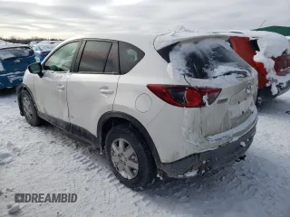 2016 Mazda CX-5 Touring z VIN JM3KE4CY1G0703496, wystawiony jako Copart lot #43806525 z przebiegiem Nie podano mil oraz Szkoda całkowita • Salvage title. Historia ofert i sprzedaży dostępna na DreamBid. Obrazek 2.