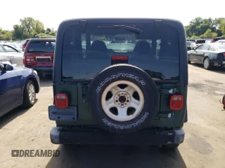 2000 Jeep Wrangler Sport with VIN 1J4FA49S4YP741154, listed as a Copart auction lot 71006864 with 200,684 mi miles and Clean Title. Bid and sale history available at carsss.com. Image 6.