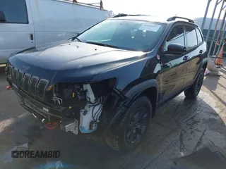 2022 Jeep Cherokee Trailhawk with VIN 1C4PJMBX1ND533715, listed as a IAAI auction lot 42041057 with 65,487 mi miles and . Bid and sale history available at DreamBid. Image 2.
