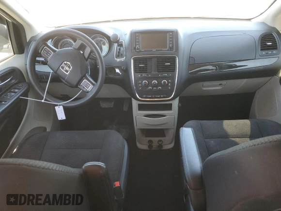 2020 Dodge Grand Caravan SE with VIN 2C4RDGBG6LR240811, listed as a Copart auction lot 47280945 with 100,986 mi miles and Salvage Title. Bid and sale history available at DreamBid. Image 8.
