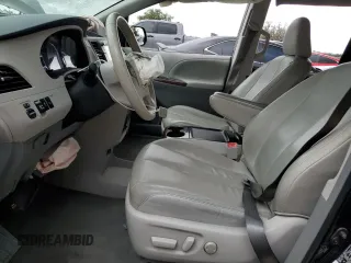2012 Toyota Sienna XLE AAS with VIN 5TDYK3DC1CS279236, listed as a Copart auction lot 63329165 with 143,937 mi miles and Salvage title. Bid and sale history available at DreamBid. Image 7.