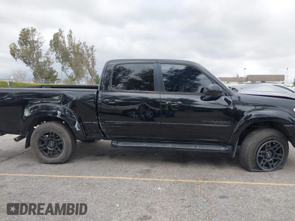 2004 Toyota Tundra Ltd with VIN 5TBET38164S442787, listed as a IAAI auction lot 41117611 with 253,166 mi miles. Bid and sale history available at carsss.com. Image 13.