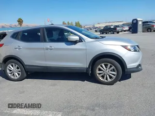 2017 Nissan Rogue SV with VIN JN1BJ1CP7HW017295, listed as a IAAI auction lot 42321408 with 84,430 mi miles and . Bid and sale history available at DreamBid. Image 13.