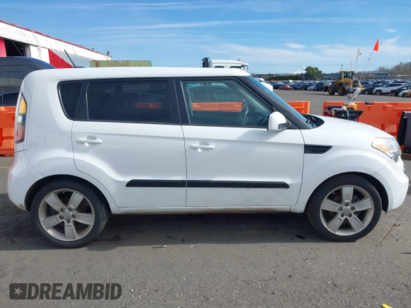 2011 Kia Soul + with VIN KNDJT2A23B7267442, listed as a IAAI auction lot 41671119 with 123,577 mi miles. Bid and sale history available at carsss.com. Image 13.
