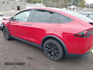 2022 Tesla Model X with VIN 7SAXCBE57NF354843, listed as a IAAI auction lot 41027188 with Not Provided miles and . Bid and sale history available at DreamBid. Image 14.