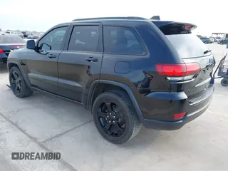 2018 Jeep Grand Cherokee Altitude with VIN 1C4RJFAG9JC436848, listed as a IAAI auction lot 42303459 with 124,044 mi miles and . Bid and sale history available at DreamBid. Image 3.