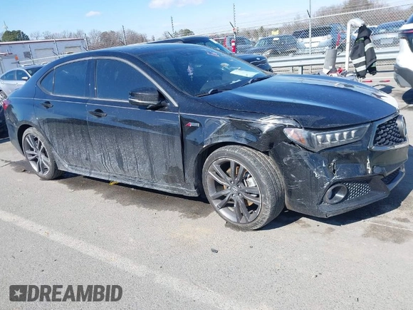 2018 Acura TLX w/A-SPEC Pkg z VIN 19UUB3F67JA001068, wystawiony jako IAAI lot #41598159 z przebiegiem 98 518 mil mil oraz . Historia ofert i sprzedaży dostępna na DreamBid. Obrazek 1.