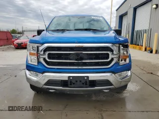 2021 Ford F-150 XL with VIN 1FTFX1E82MKE64671, listed as a Copart auction lot 51819705 with 34,913 mi miles and Salvage title. Bid and sale history available at DreamBid. Image 5.