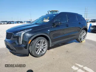 2020 Cadillac XT4 FWD Sport z VIN 1GYFZER40LF141634, wystawiony jako Copart lot #52035165 z przebiegiem 20 882 mil mil oraz Szkoda całkowita • Salvage title. Historia ofert i sprzedaży dostępna na DreamBid. Obrazek 1.