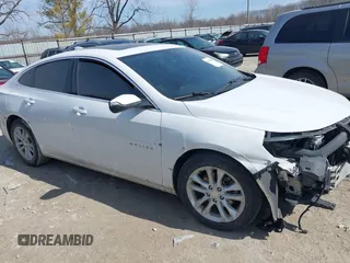 2018 Chevrolet Malibu LT z VIN 1G1ZD5ST6JF238524, wystawiony jako IAAI lot #41701717 z przebiegiem 167 986 mil mil oraz . Historia ofert i sprzedaży dostępna na DreamBid. Obrazek 13.