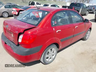 2009 Kia Rio SX with VIN KNADE223396484470, listed as a IAAI auction lot 41964027 with 167,380 mi miles. Bid and sale history available at carsss.com. Image 4.