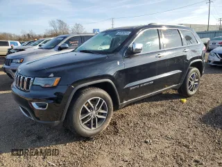 2018 Jeep Grand Cherokee Limited with VIN 1C4RJFBG0JC298468, listed as a Copart auction lot 82975214 with 57,499 mi miles and Salvage Title. Bid and sale history available at carsss.com. Image 1.