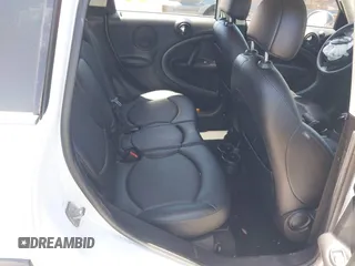 2014 MINI Countryman S z VIN WMWZC3C56EWP52407, wystawiony jako IAAI lot #42255716 z przebiegiem 74 943 mil mil oraz . Historia ofert i sprzedaży dostępna na DreamBid. Obrazek 8.