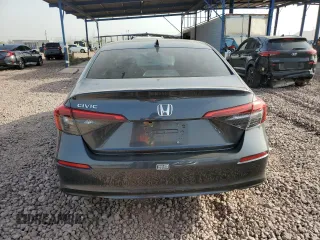 2023 Honda Civic EX with VIN 2HGFE1F7XPH317930, listed as a Copart auction lot 63257205 with 44,600 mi miles and Salvage title. Bid and sale history available at DreamBid. Image 6.