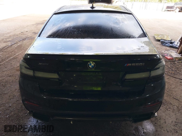 2018 BMW 5 Series M550i xDrive with VIN WBAJB9C51JB035949, listed as a IAAI auction lot 42085727 with Not provided miles and . Bid and sale history available at DreamBid. Image 15.