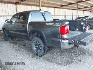 2017 Toyota Tacoma SR5 with VIN 3TMCZ5AN6HM045057, listed as a IAAI auction lot 41883533 with 213,760 mi miles and . Bid and sale history available at carsss.com. Image 3.
