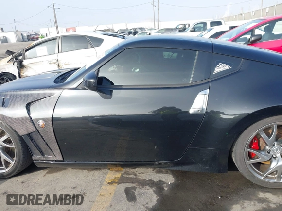 2014 Nissan 370Z Touring with VIN JN1AZ4EH1EM631097, listed as a IAAI auction lot 41230197 with 85,304 mi miles. Bid and sale history available at carsss.com. Image 14.