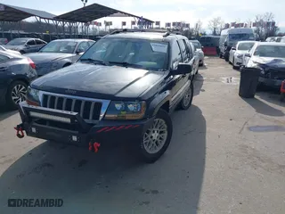 2004 Jeep Grand Cherokee Limited with VIN 1J4GW58N74C120435, listed as a IAAI auction lot 41815094 with 193,056 mi miles. Bid and sale history available at carsss.com. Image 18.