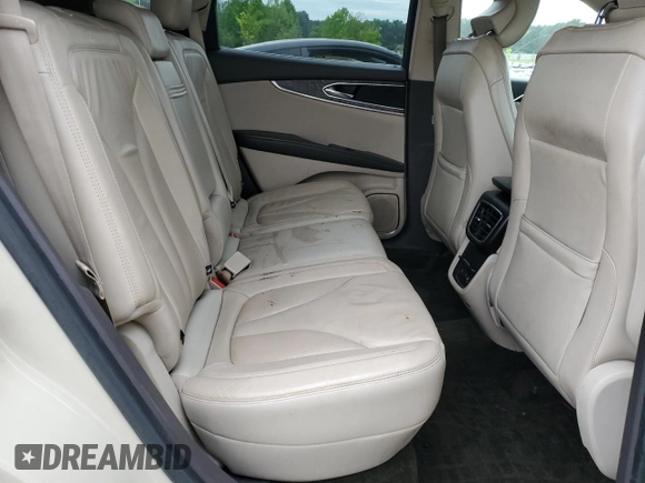 2016 Lincoln MKX Select z VIN 2LMTJ6KR6GBL84027, wystawiony jako Copart lot #54084425 z przebiegiem 122 304 mil mil oraz Szkoda całkowita • Salvage title. Historia ofert i sprzedaży dostępna na DreamBid. Obrazek 11.