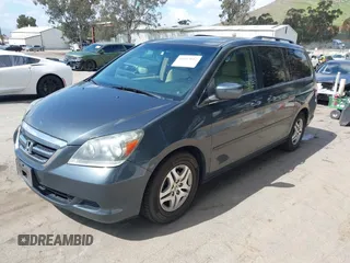 2005 Honda Odyssey EX-L with VIN 5FNRL38725B084980, listed as a IAAI auction lot 41917012 with 134,685 mi miles. Bid and sale history available at carsss.com. Image 2.