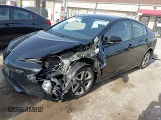 2017 Toyota Prius Two with VIN JTDKARFU5H3045014, listed as a IAAI auction lot 42152419 with 69,760 mi miles and . Bid and sale history available at DreamBid. Image 2.