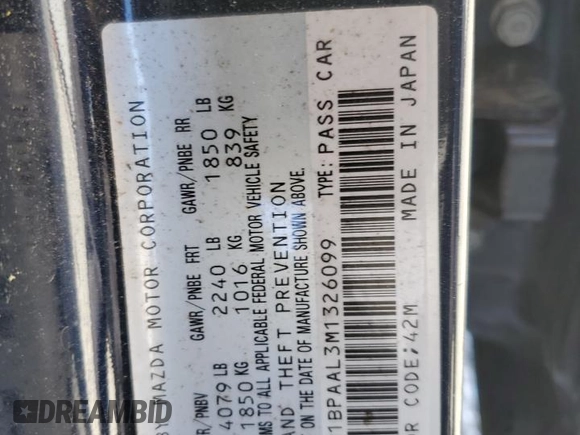 2021 Mazda 3 S with VIN JM1BPAAL3M1326099, listed as a Copart auction lot 52400115 with 58,159 mi miles and Salvage Title. Bid and sale history available at DreamBid. Image 13.