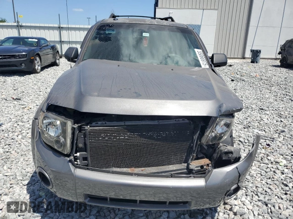 2010 Ford Escape XLT с VIN 1FMCU0D77AKA50940, выставлен на аукционе Copart как лот 55066975 с пробегом 169 940 миль миль и Списание • Salvage title. История ставок и продаж доступна на DreamBid. Изображение 5.