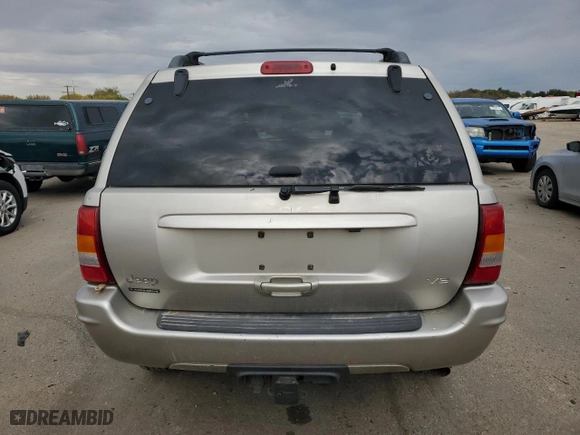 2003 Jeep Grand Cherokee Limited with VIN 1J8GW58N43C546645, listed as a Copart auction lot 77046984 with 186,039 mi miles and Clean Title. Bid and sale history available at carsss.com. Image 6.