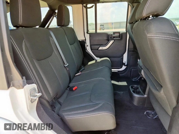 2014 Jeep Wrangler Unlimited Sahara with VIN 1C4BJWEG5EL309502, listed as a Copart auction lot 61804885 with 60,683 mi miles and Salvage title. Bid and sale history available at DreamBid. Image 10.
