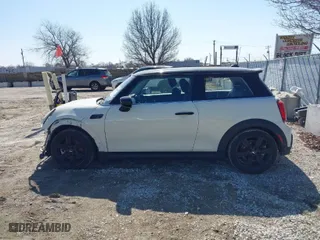 2023 MINI Hardtop 2 Door Cooper S with VIN WMW53DH09P2T13990, listed as a IAAI auction lot 41780668 with 17,105 mi miles. Bid and sale history available at carsss.com. Image 14.
