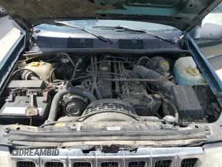 1996 Jeep Grand Cherokee Laredo z VIN 1J4GZ58S8TC222435, wystawiony jako Copart lot #62347665 z przebiegiem 202 125 mil mil oraz Czysty tytuł • Clean title. Historia ofert i sprzedaży dostępna na DreamBid. Obrazek 12.