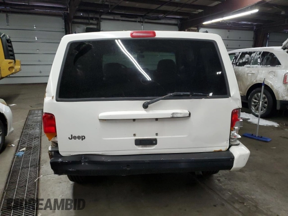 1997 Jeep Cherokee Country with VIN 1J4FJ78S0VL587323, listed as a Copart auction lot 89295355 with 205,432 mi miles and Salvage Title. Bid and sale history available at carsss.com. Image 6.