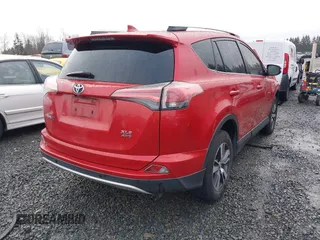 2016 Toyota RAV4 XLE with VIN JTMRFREV5GJ092337, listed as a IAAI auction lot 41597345 with 84,292 mi miles and . Bid and sale history available at DreamBid. Image 4.
