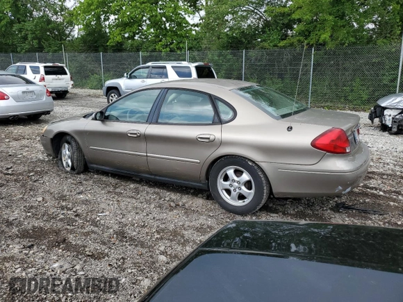 2003 Ford Taurus SES Standard z VIN 1FAFP55U33A123732, wystawiony jako Copart lot #58837395 z przebiegiem 169 159 mil mil oraz Szkoda całkowita • Salvage title. Historia ofert i sprzedaży dostępna na DreamBid. Obrazek 2.