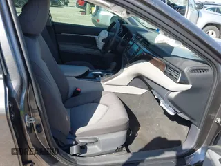 2019 Toyota Camry LE with VIN 4T1B11HK9KU810347, listed as a IAAI auction lot 41804007 with 75,063 mi miles and . Bid and sale history available at DreamBid. Image 5.