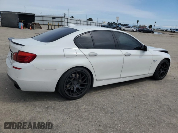 2013 BMW 5 Series 550i with VIN WBAFR9C51DDX79979, listed as a Copart auction lot 49821645 with 170,080 mi miles and Salvage Title. Bid and sale history available at DreamBid. Image 3.